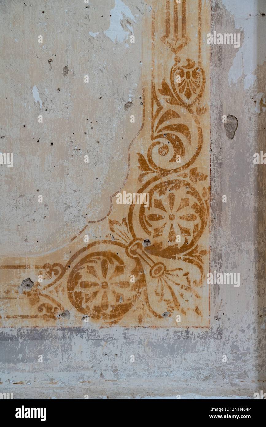 Un affresco sbiadito su un muro di gesso danneggiato nella Chiesa di Soledad Vista Hermosa a San Agustin, Etla, Oaxaca, Messico. Foto Stock