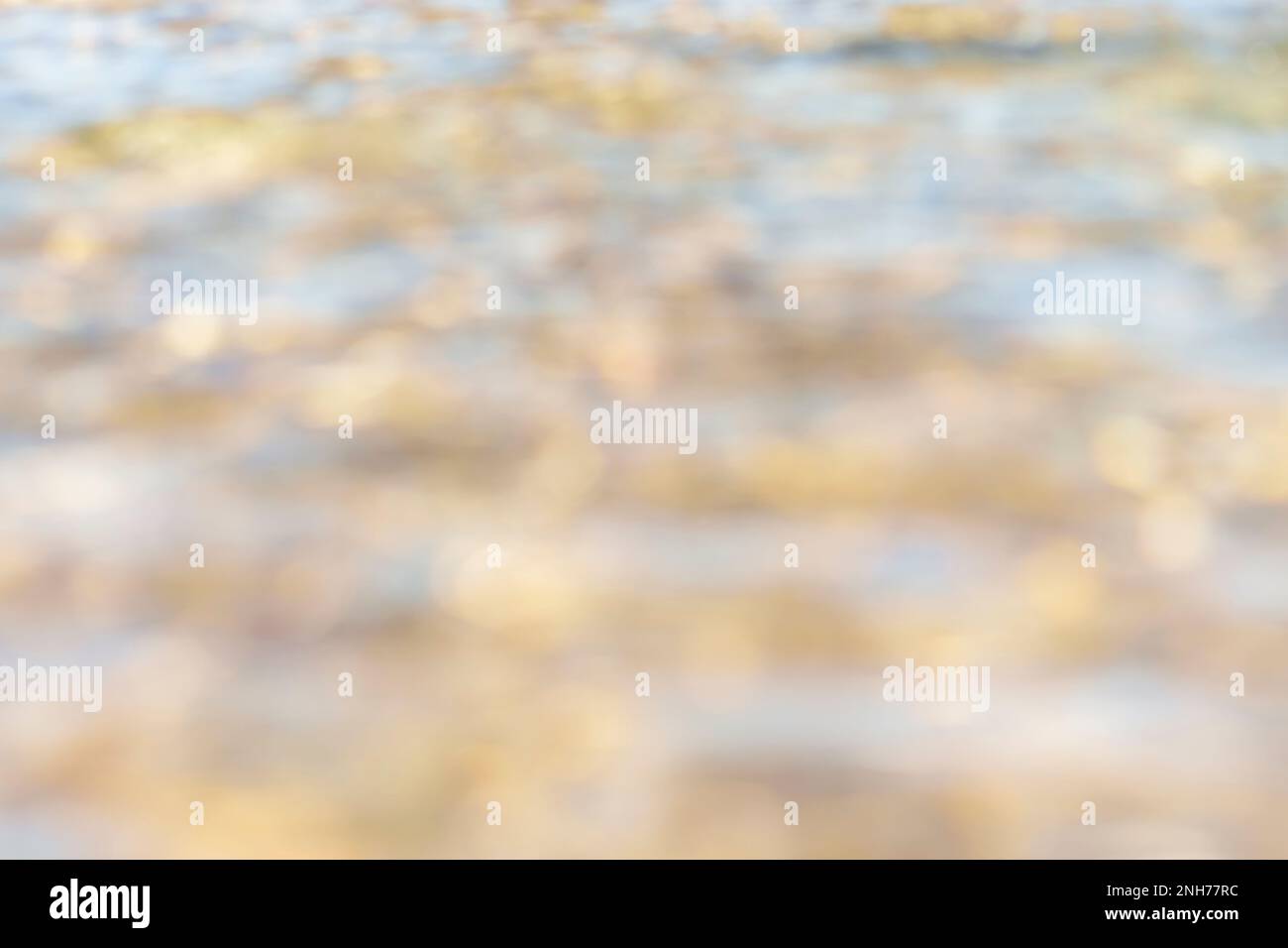 Astratto acqua leggera superficie scintillante in bokeh Foto Stock