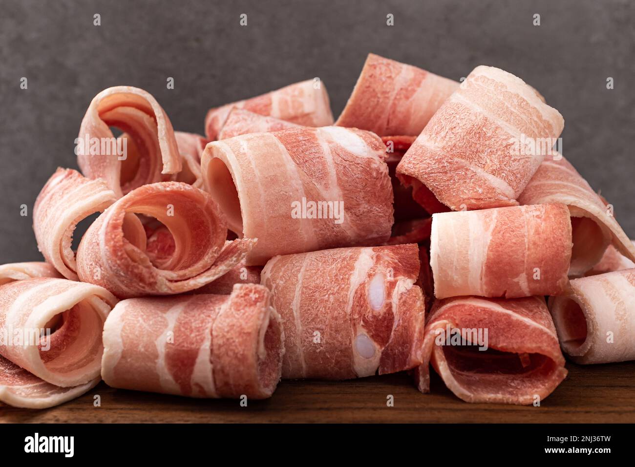 ​​pork a fette sottili. Panino di maiale surgelato. Cultura gastronomica coreana Foto Stock