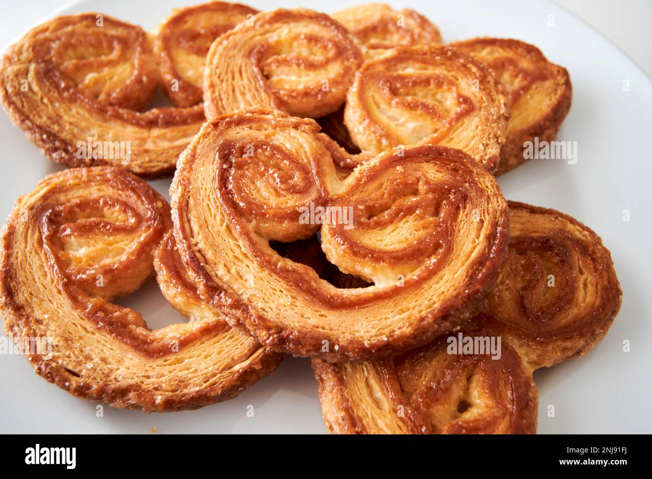 palmeras palmier biscotti noti anche come palmier maiali orecchio palma cuore e elefante orecchio Lanzarote, Isole Canarie, Spagna Foto Stock