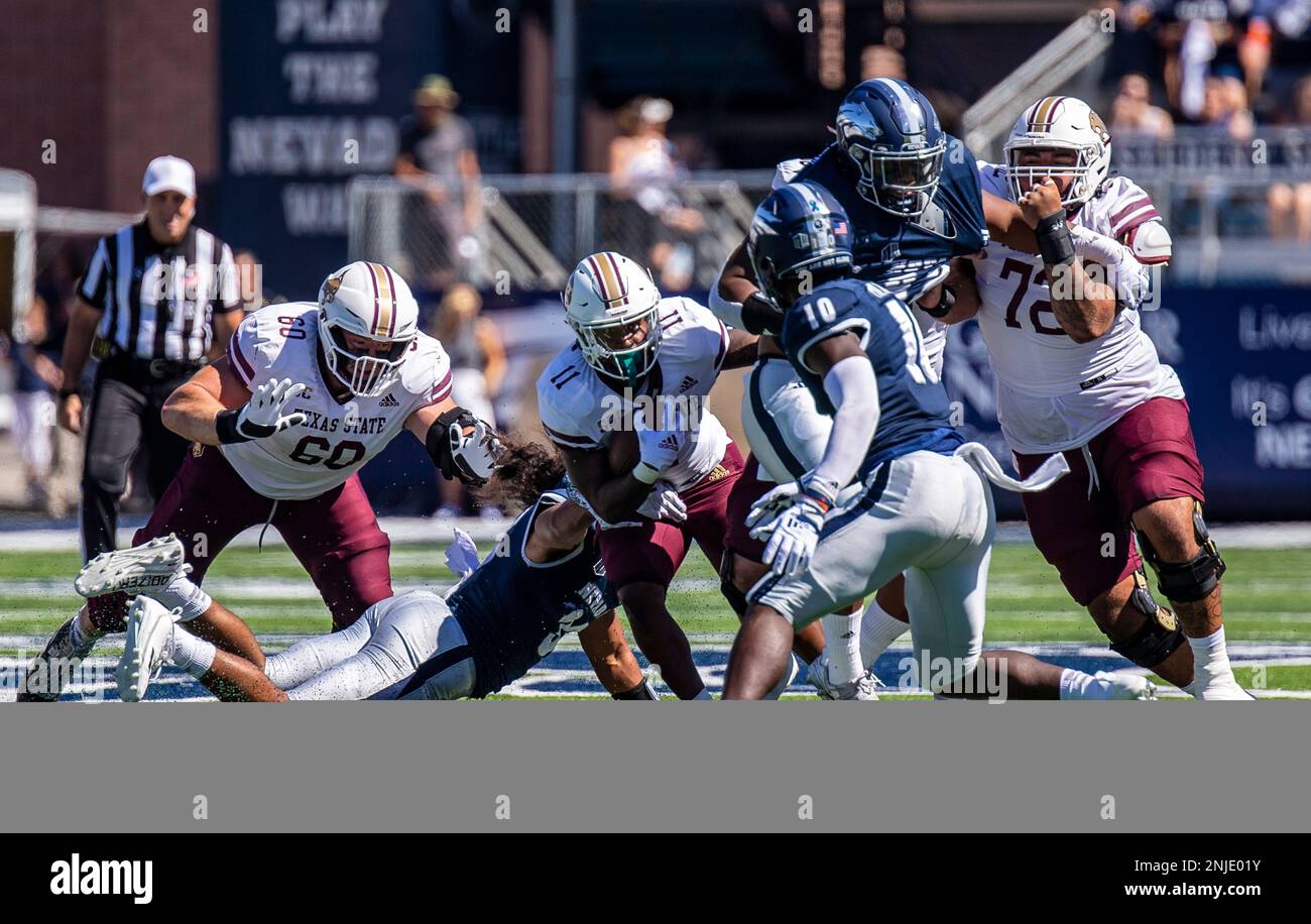 September 03 2022 Reno, NV USA Texas State running back Calvin Hill (11)struggled to get a short gain during the NCAA Football game between Texas State Bobcats and the Nevada Wolf Pack. Nevada won 38-14 at Mackay Stadium Reno, Nevada Thurman James/CSM (Credit Image: © Thurman James/CSM via ZUMA Press Wire) (Cal Sport Media via AP Images) Foto Stock