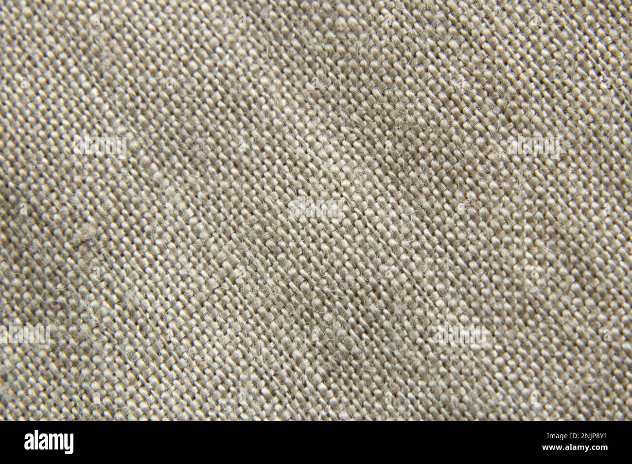 sfondo in tessuto beige chiaro come sfondo macro Foto Stock