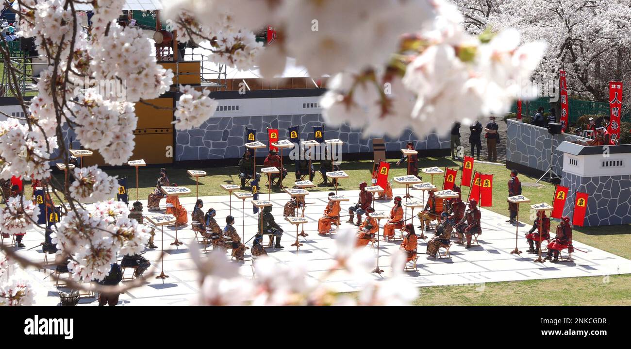 Local high school students perform Ningen Shogi, human Japanese chess on  top of Mt. Maizuru, in Tendo, Yamagata Prefecture on April 22, 2017. Tendo  is known for production of shogi koma,'' pieces