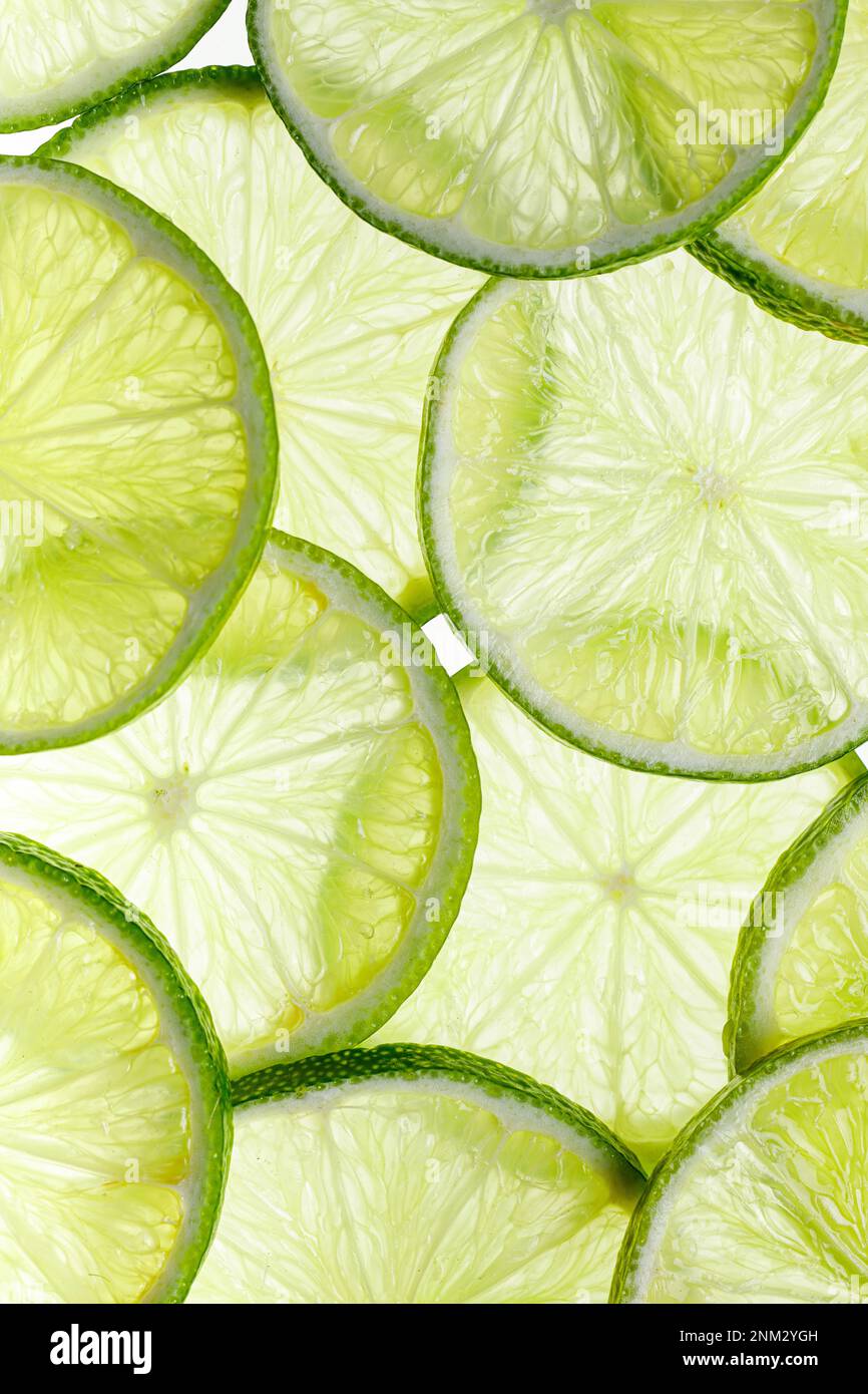 lime a fette, agrumi, consistenza, sfondo Foto Stock