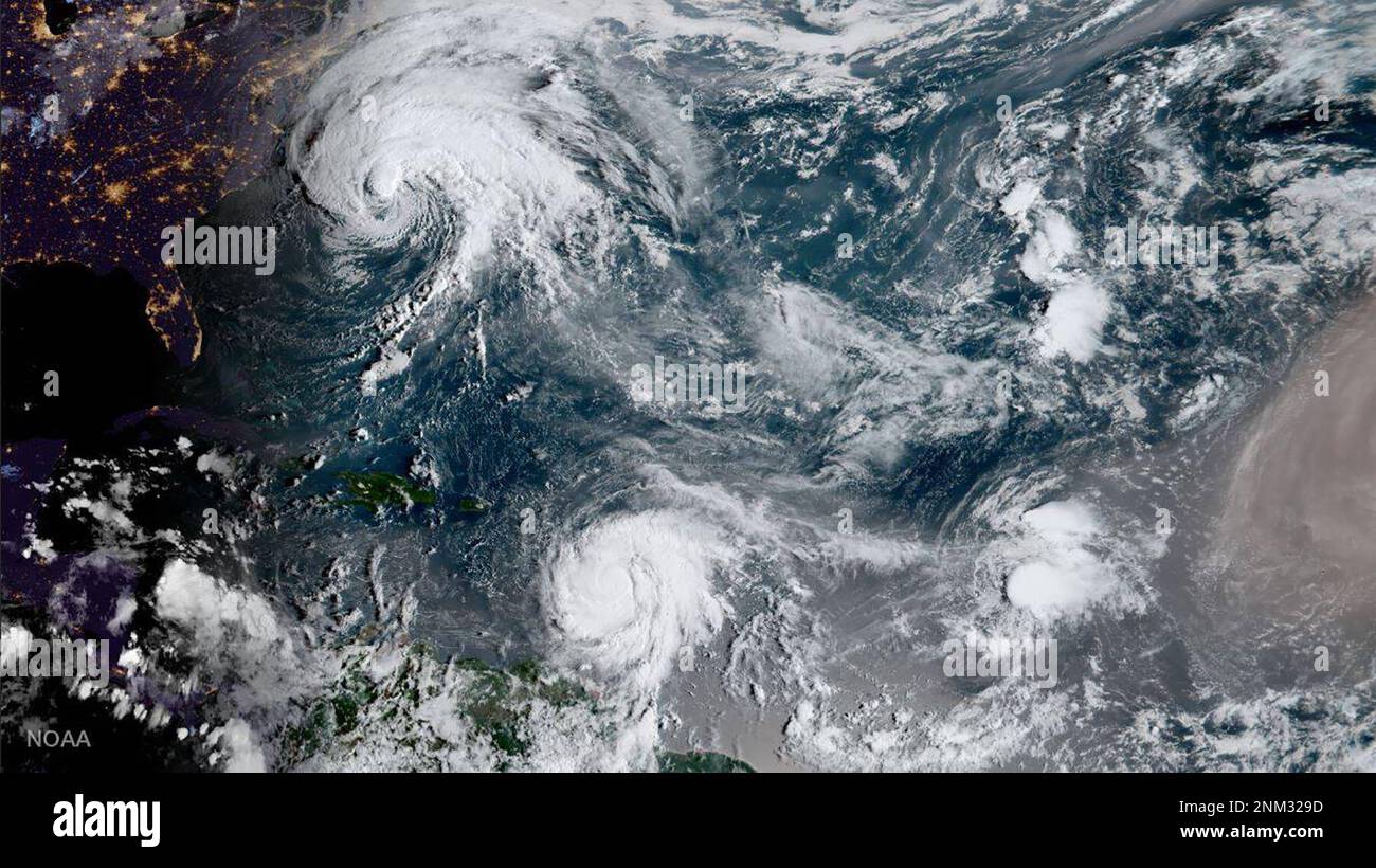 Il GOES-16 di NOAA catturò questa immagine geocolor degli uragani Jose (l) e Maria (c), e della depressione tropicale Lee (r) nell'Oceano Atlantico questa mattina, 18 settembre 2017 Foto Stock
