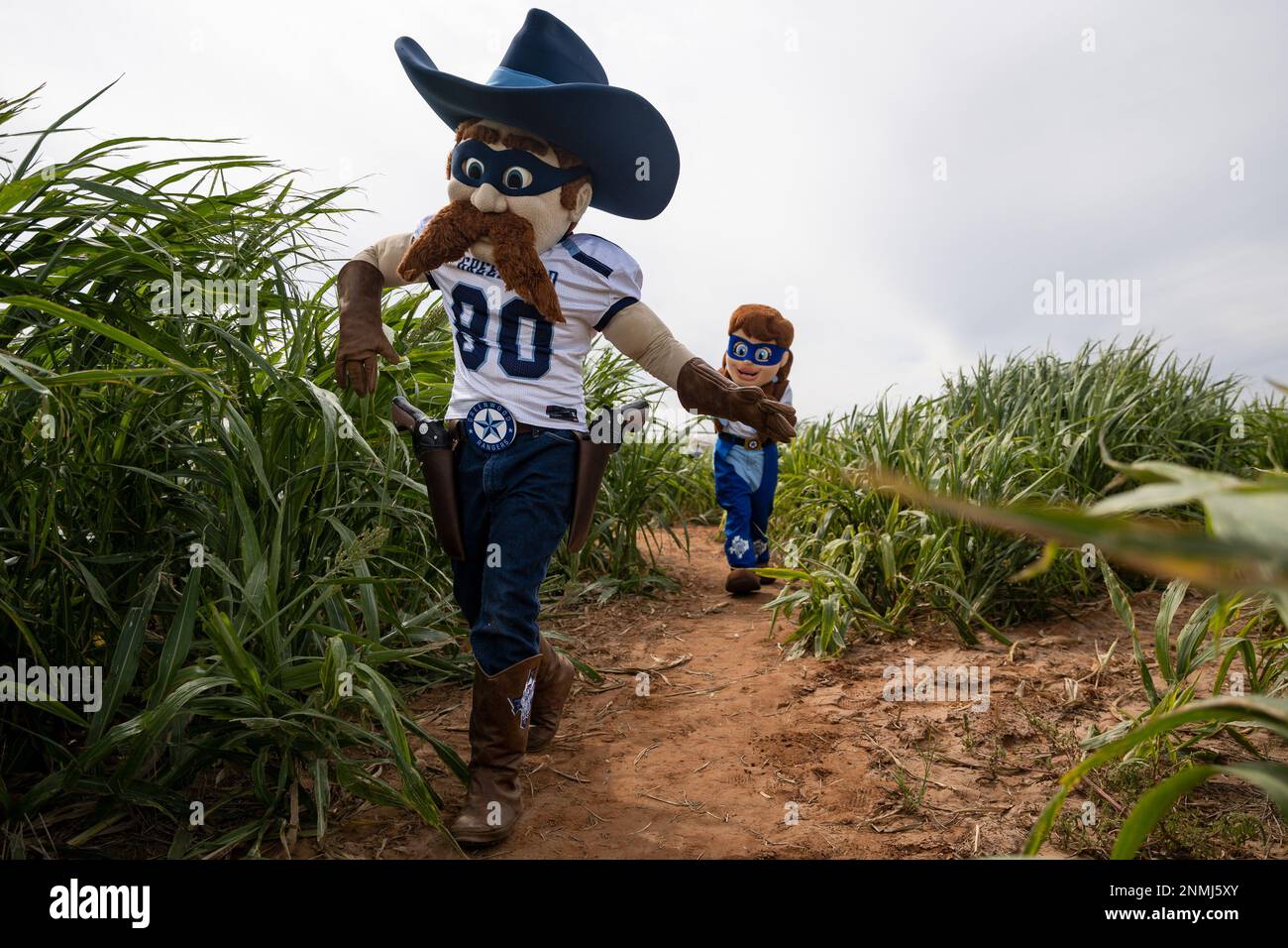 Greenwood High School mascots Rowdy, left, and Roxy make their way