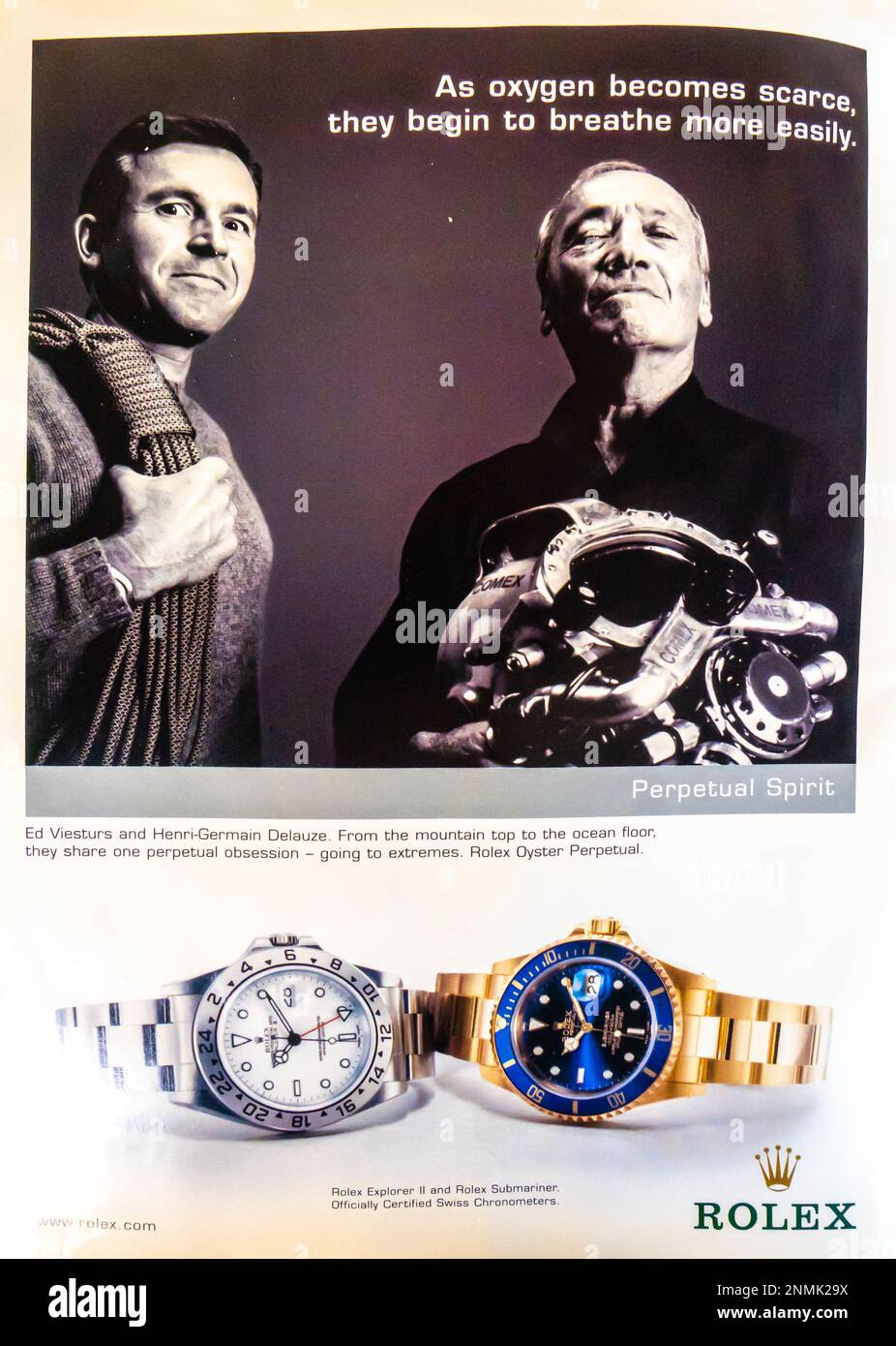 Spot Rolex Perpetual Spirit in una rivista, luglio 2003. Rolex Explorer 2 e Rolex Submariner - ed Viesturs e Henry-Germain Delauze Foto Stock