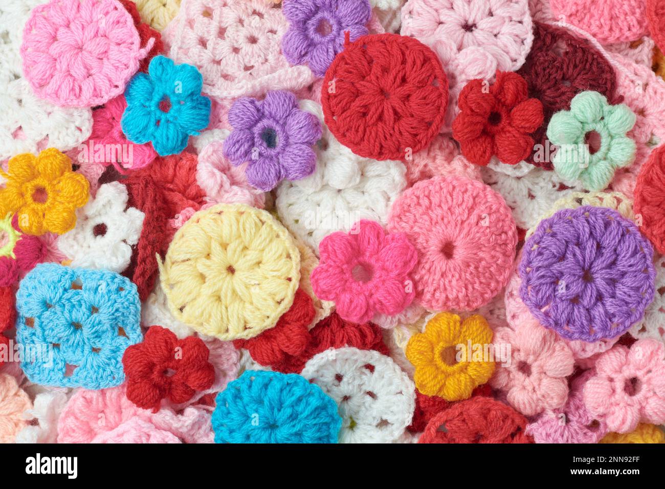 diversi modelli di tessuto di lana lavorato a maglia astratto, full frame di colorato filato tessuto, maglieria e artigianato concetto sfondo carta da parati Foto Stock