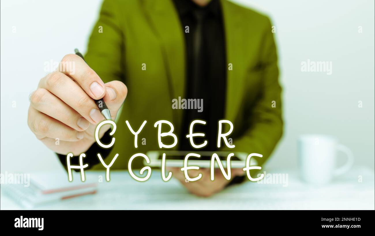 Scrittura a mano Cyber Hygiene. Parola per le misure che gli utenti del calcolatore prendono per migliorare la loro sicurezza cibernetica Foto Stock