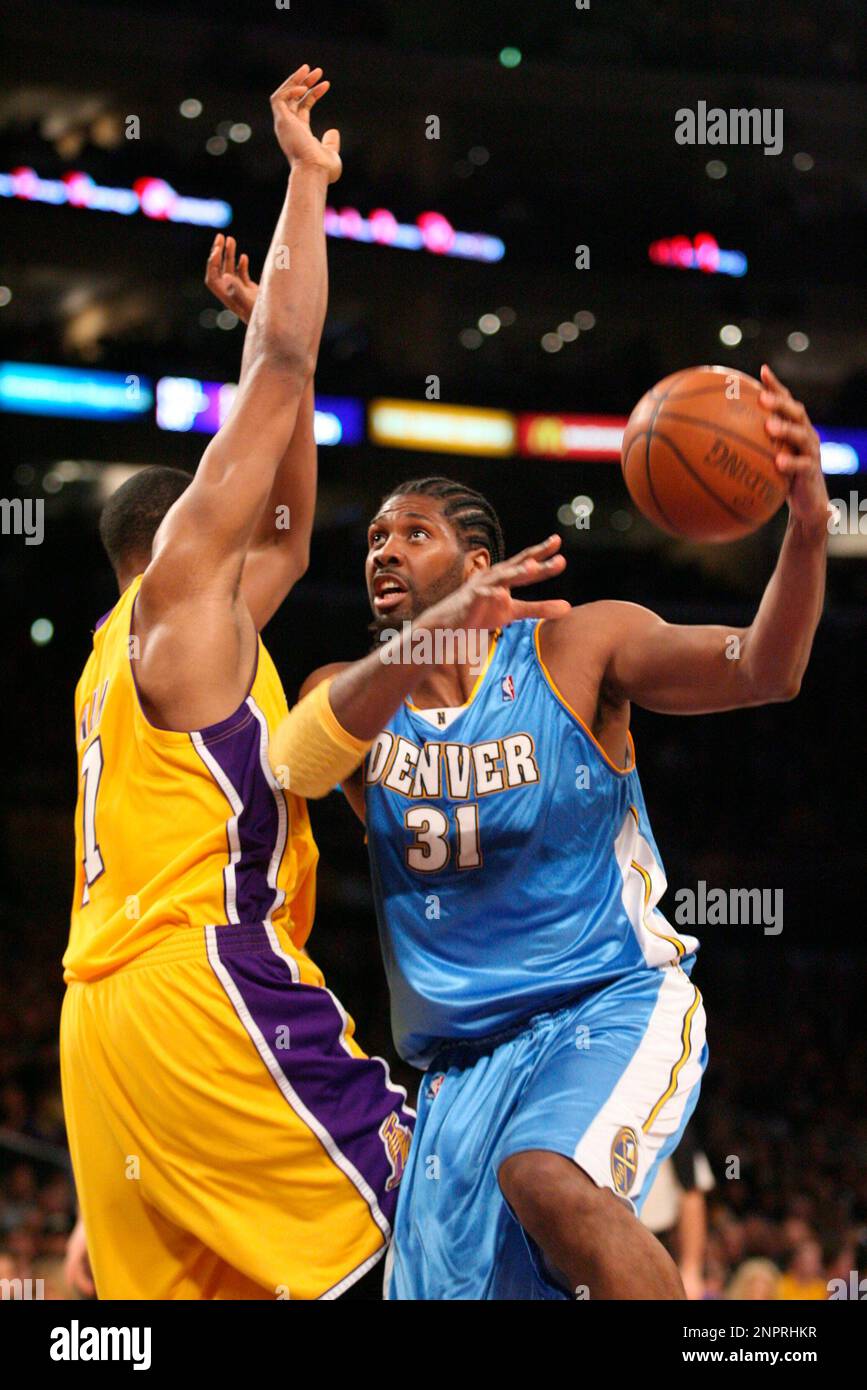 Denver Nuggets center Nene' (31) makes a move with the basketball against the Los Angeles Lakers during an NBA game, Feb. 5, 2010 in Los Angeles. The Nuggets defeated the Lakers by the final score of 126-113. (Kevin Reece via AP) Foto Stock