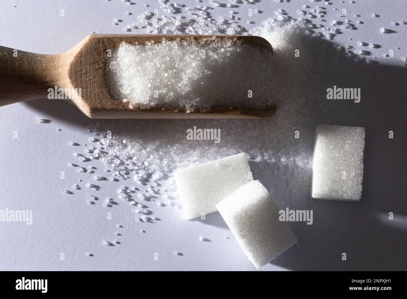 Zucchero nella materia prima: Un macrofone ipnotizzante di dolcezza granulata Foto Stock