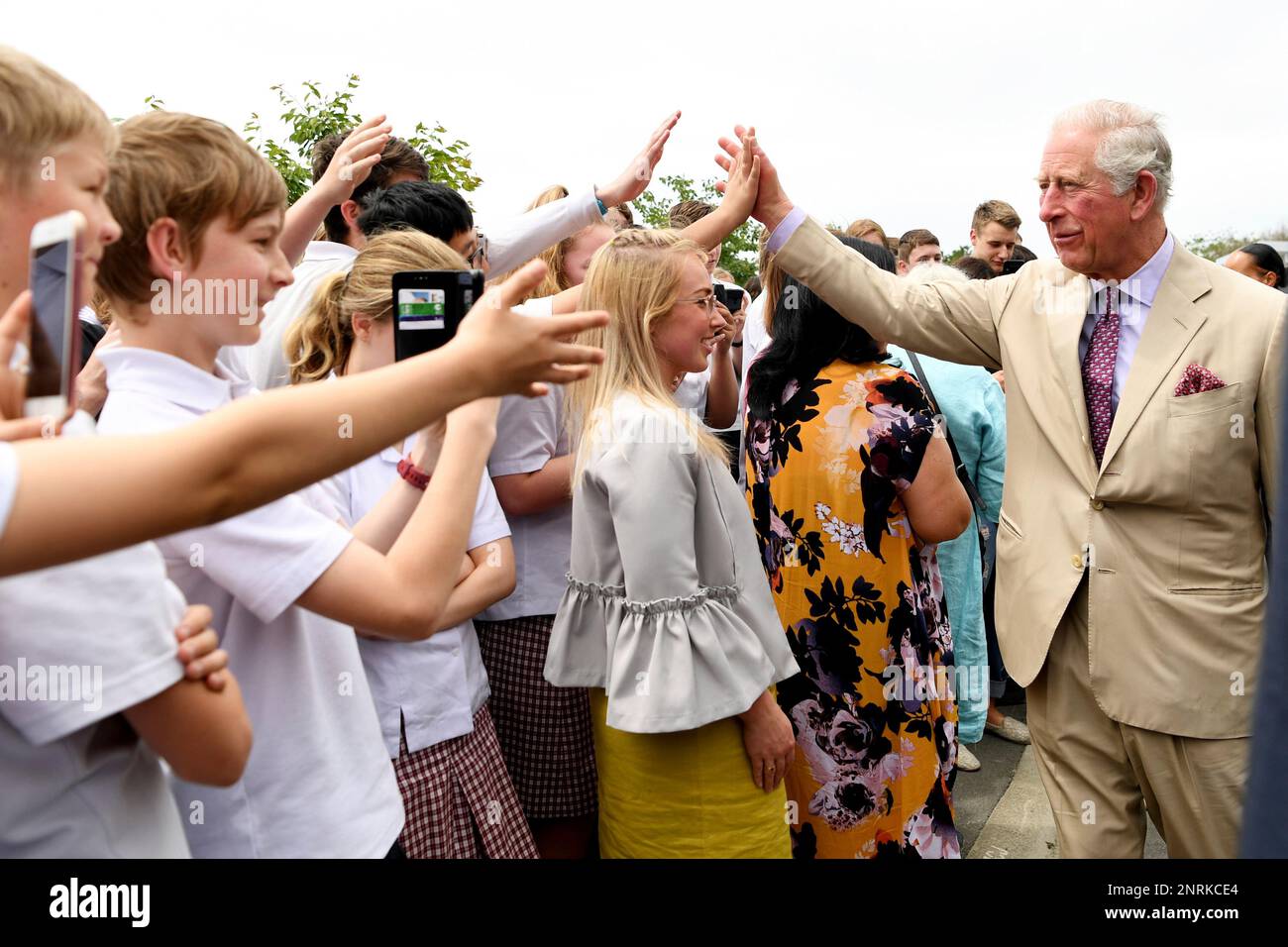 Britain's Prince Charles greets students during a visit to Cashmere High School in Cashmere, New Zealand, Friday, Nov. 22, 2019. (Tracey Nearmy/Pool Photo via AP) Foto Stock