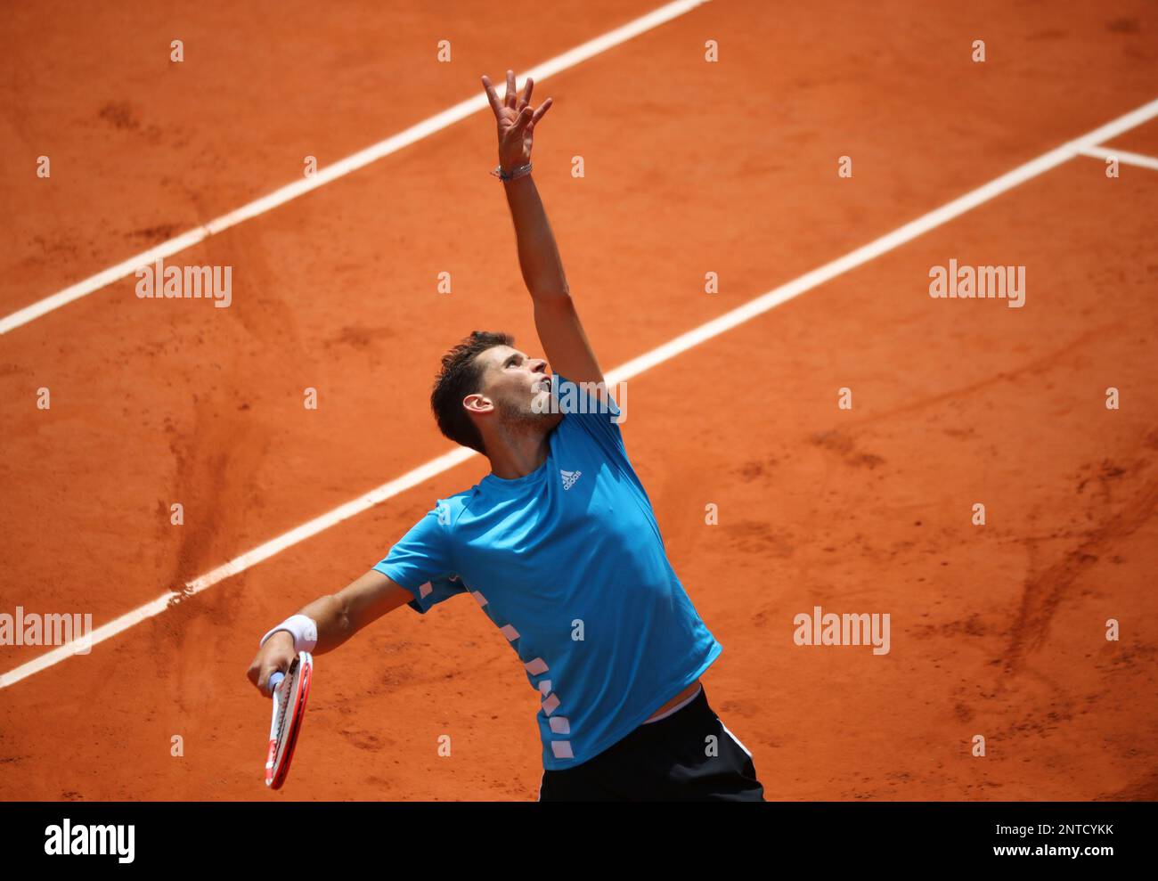 Dominic THIEM of Austria serves during the men's singles semifinals of the French Open tennis tournament against Novak DJOKOVIC of Serbia at Roland-Garros in Paris, France on June 8, 2019. ( The Yomiuri Shimbun via AP Images ) Foto Stock