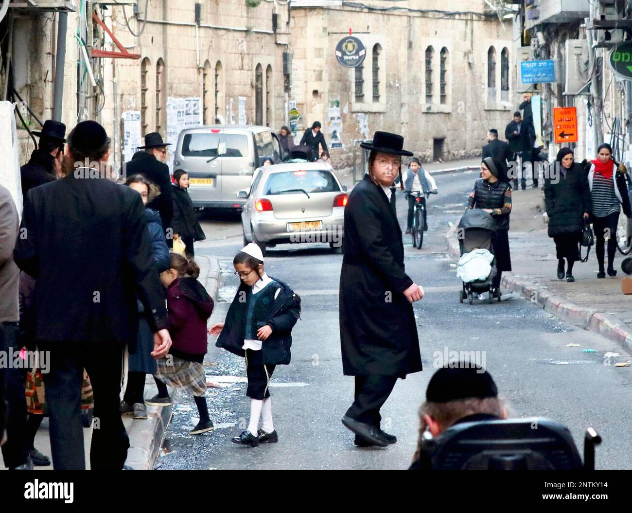 Haredi Judaism, ultra-Orthodox Judaism, men wearing a black suit and a black hat are pictured in Mea Shearim, one of the oldest Jewish neighborhoods, in Jerusalem, Israel on April 2, 2019. ( The Yomiuri Shimbun via AP Images ) Foto Stock
