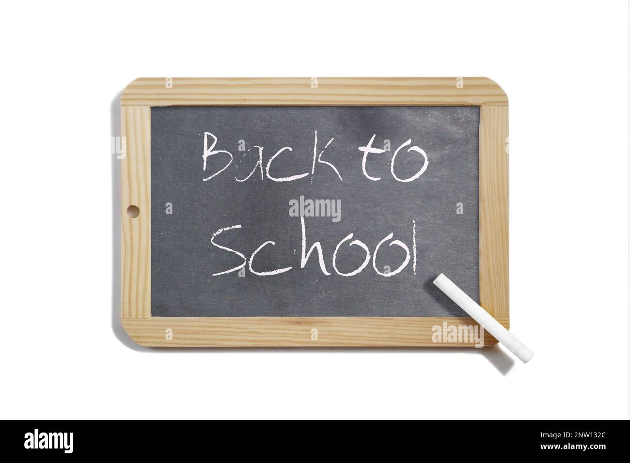 Scrivere ardesia con scritto - Torna a scuola - isolato su uno sfondo bianco. Foto Stock