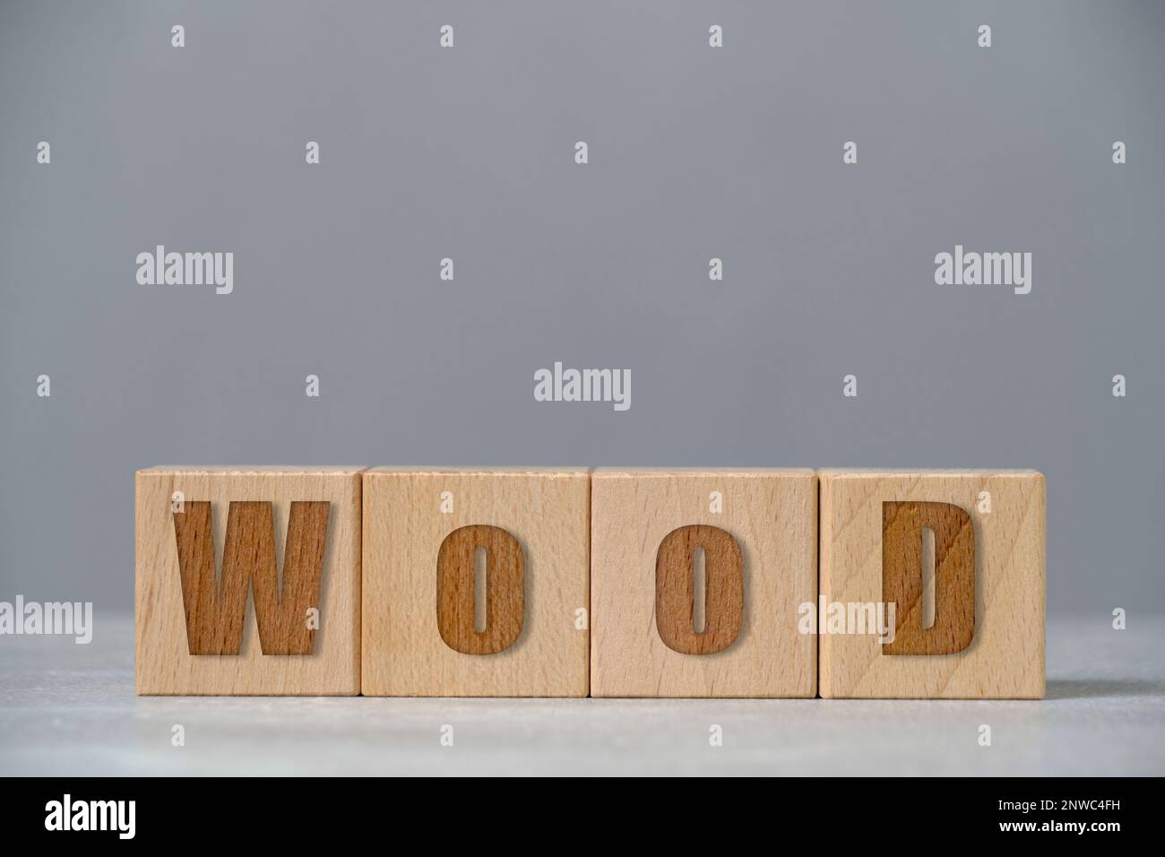 Iscrizione in legno su materiale di legno cubes.Environmentally friendly Foto Stock