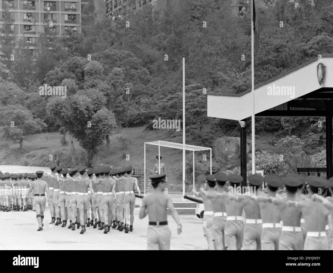 Recluta polizia Constables pratica sul (Royal Hong Kong Police) Scuola di formazione della polizia Drill Square, Wong Chuk Hang, Aberdeen, Hong Kong Estate 1984 Foto Stock