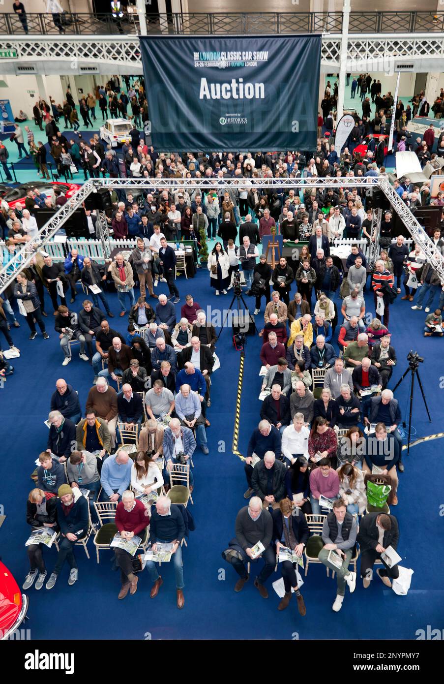 Full House al 2023, London Classic Car Show Live Auction, guidato da The Official Auction Partners, Historics Auctioneers Foto Stock