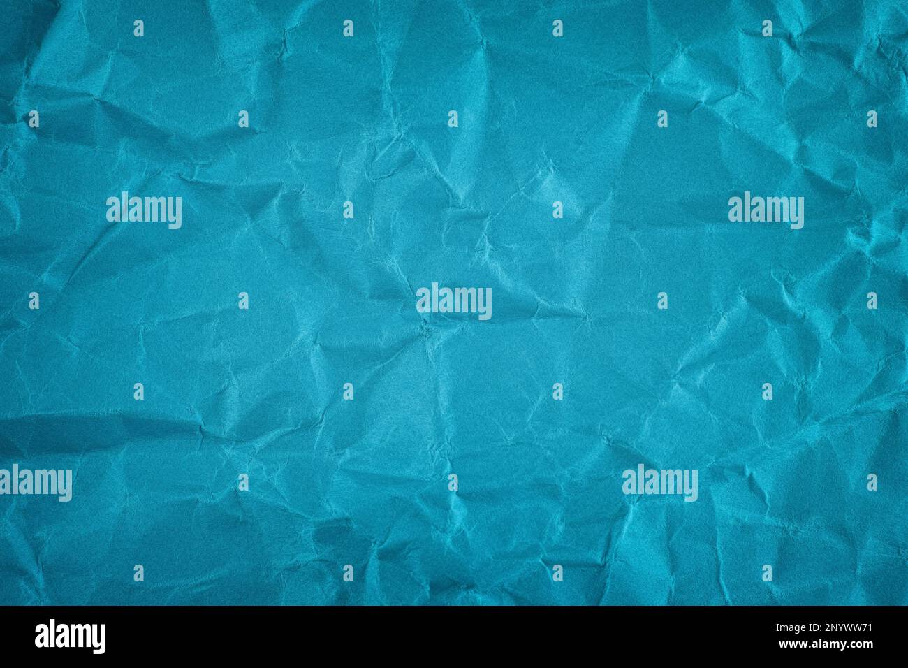 Uno sfondo di carta blu stropicciato. Primo piano. Foto Stock