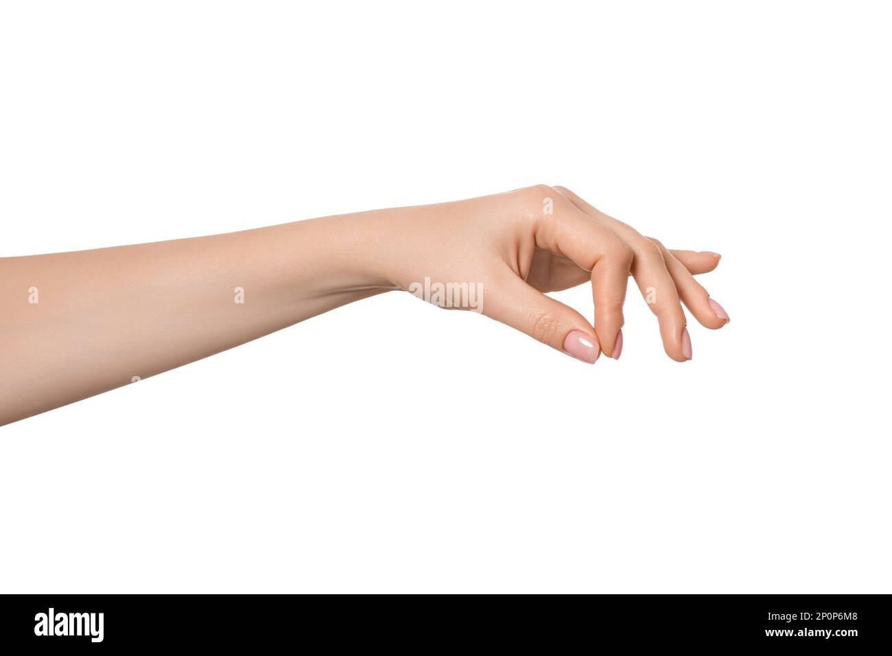La mano di una donna tiene o tira un filo o una corda invisibile. Mani vuote. Foto Stock