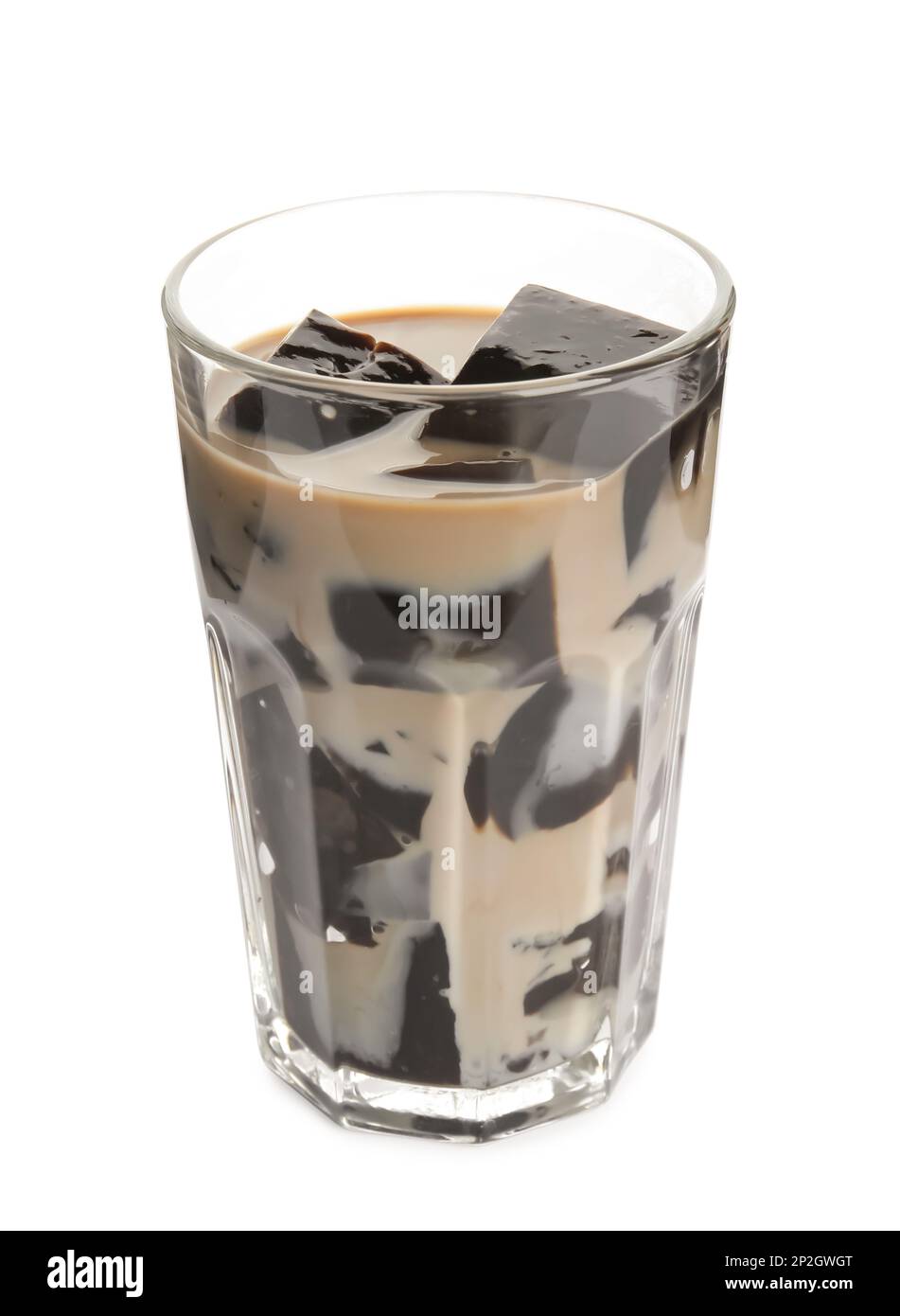 Bicchiere di latte con gelatina d'erba isolato su bianco Foto Stock