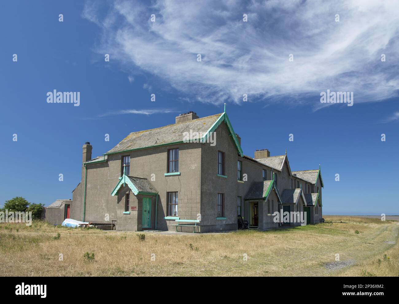 Vecchi cottage pilota vicino alla costa, Isola di Piel, Isole di Furness, Barrow-in-Furness, Cumbria, Inghilterra, Regno Unito Foto Stock