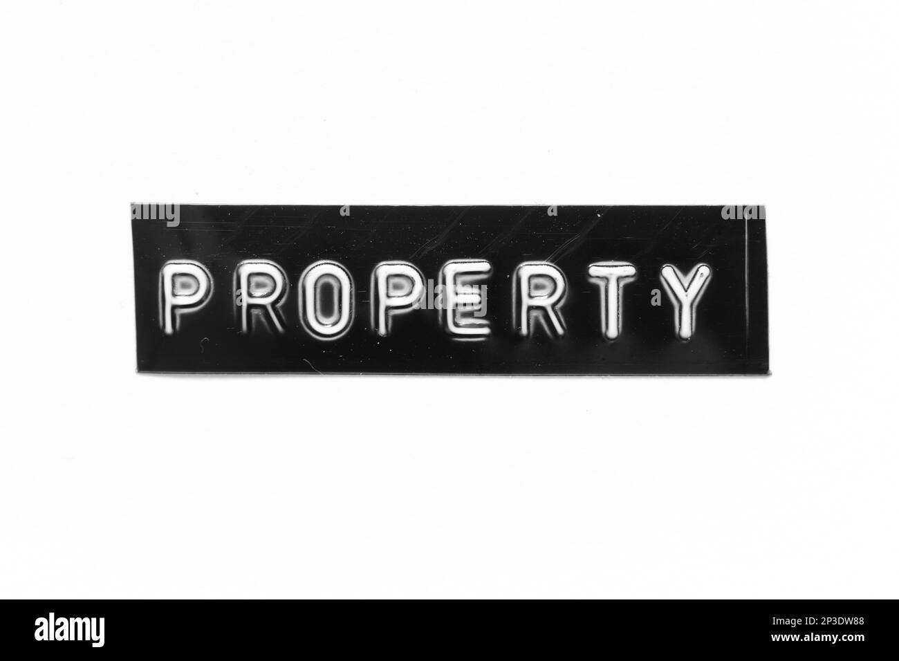 Banner nero con lettera in rilievo con proprietà Word su sfondo bianco Foto Stock