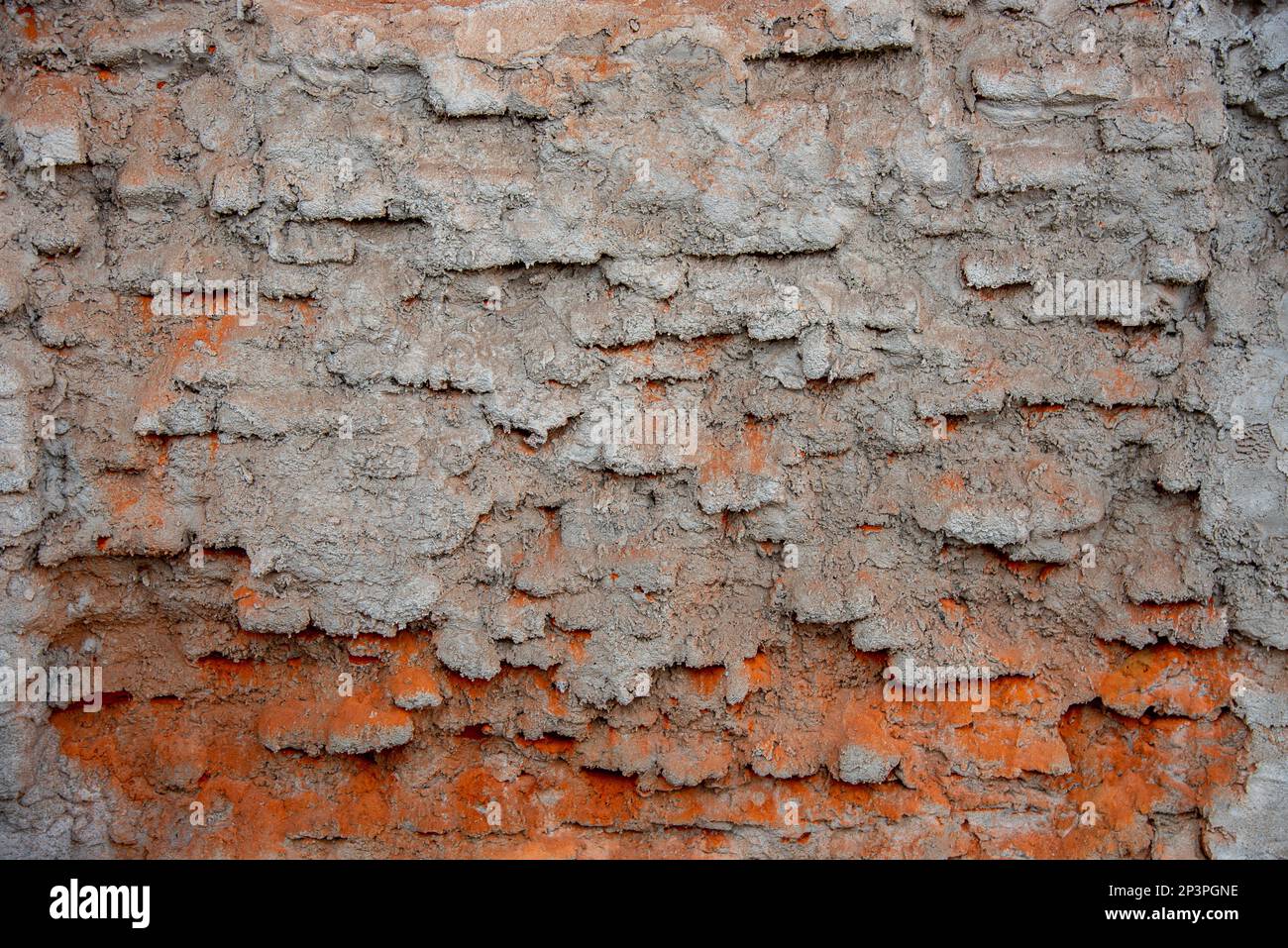 Texture di vecchio muro di mattoni sbriciolati con cemento, spazio copia Foto Stock