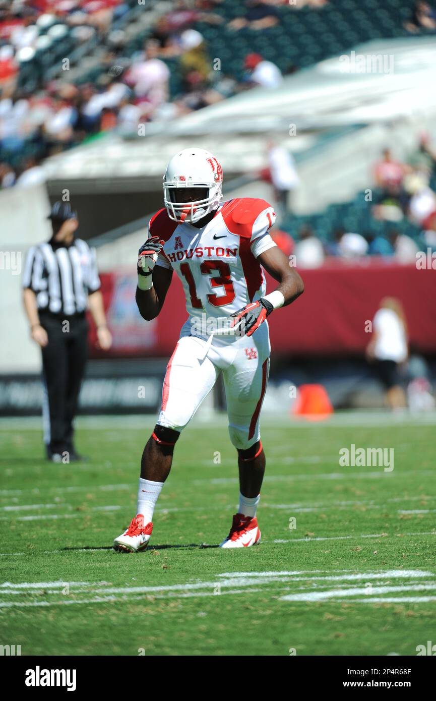 University of Houston Cougars defensiveback Thomas Bates (13) during game against Temple University Owls played at Lincoln Financial Field on Saturday, September 07, 2013 in Philadelphia, PA. Houston defeated Temple 22-13. (AP Photo/Tomasso DeRosa) Foto Stock