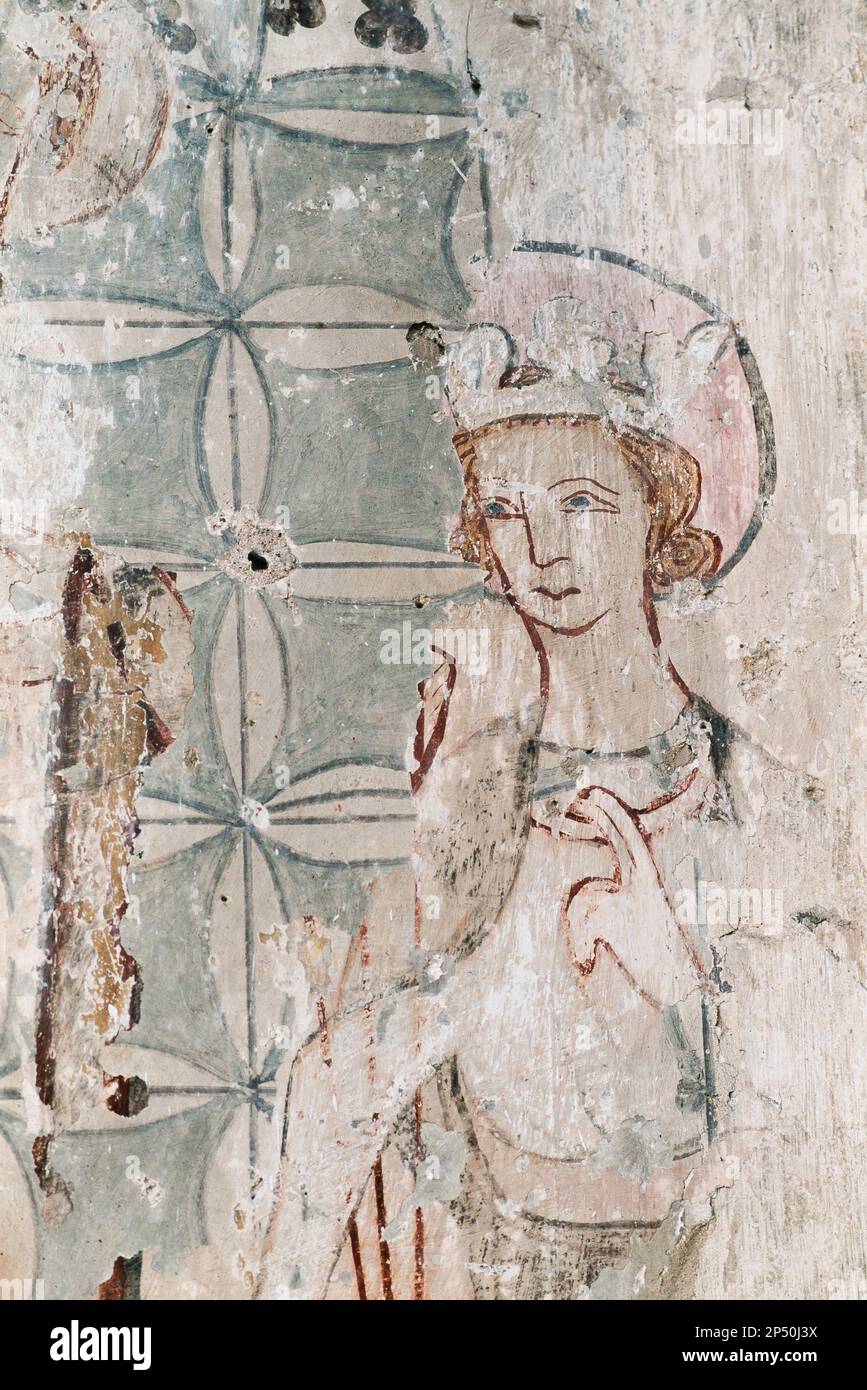 Pittura murale medievale, particolare di una pittura murale raffigurante re Edmund (Saint Edmund) all'interno della Chiesa di Santa Maria a Lakenheath, Suffolk, Inghilterra Foto Stock