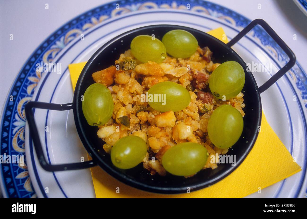 Migas manchegas, Venta del Quijote, famoso ristorante tipico, cucina tradizionale, Puerto Lapice, provincia di Ciudad Real, Castilla la Mancha, il ro Foto Stock