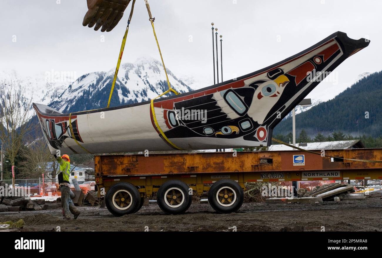 CBC construction worker Patrick O’Brien guides the 50foot Tlingit war