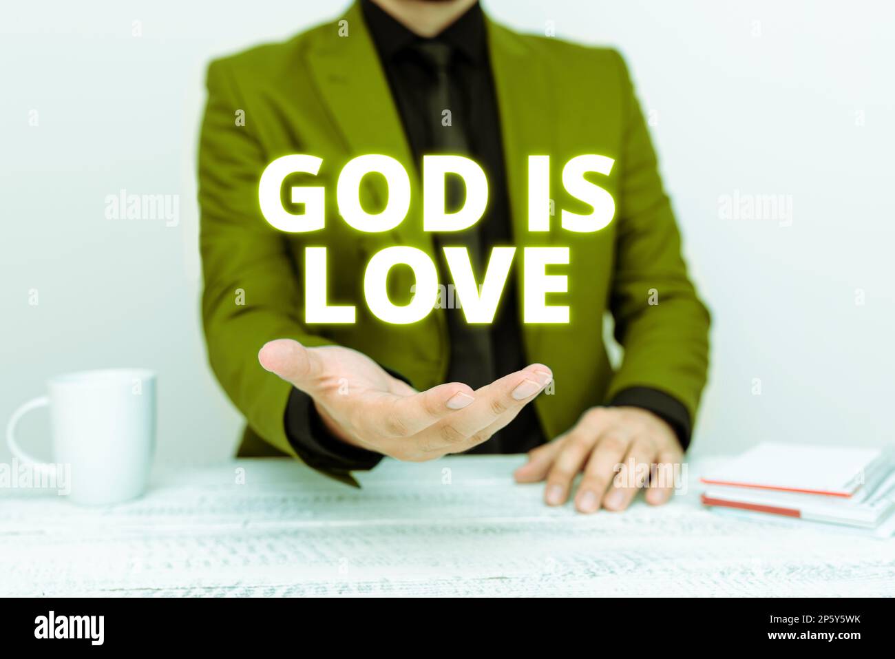 Scrittura del testo Dio è amore. Concetto di Internet credere in Gesù avere fede pensieri religiosi Cristianesimo Foto Stock