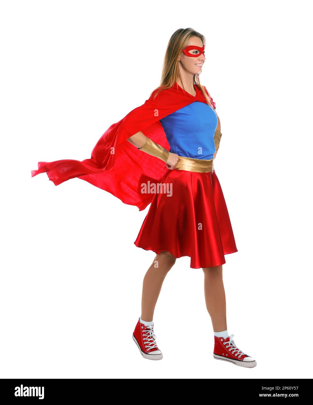 Donna sicura che indossa il costume di supereroe su sfondo bianco Foto  stock - Alamy