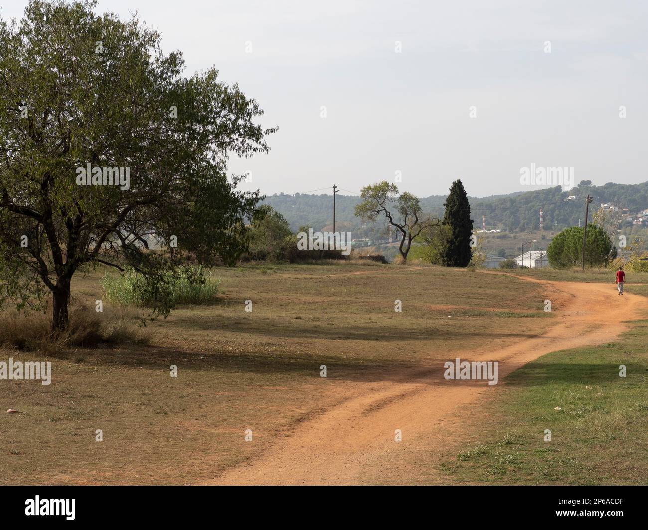 Strada di campagna verso casa Foto Stock