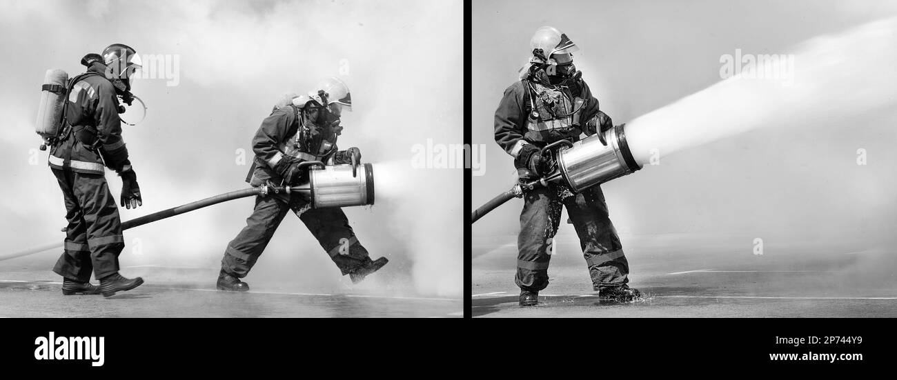 Fire estinguere il fuoco con schiuma nel fumo Foto Stock