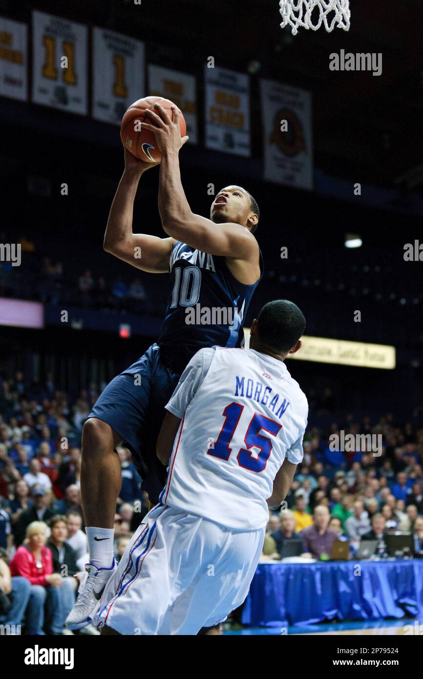 February 19 2011: Corey Fisher of Vilanova goes up and over DePaul's Moses Morgan for a basket at Allstate Arena, Rosemont, Illinois. (Cal Sports Media via AP Images) Foto Stock