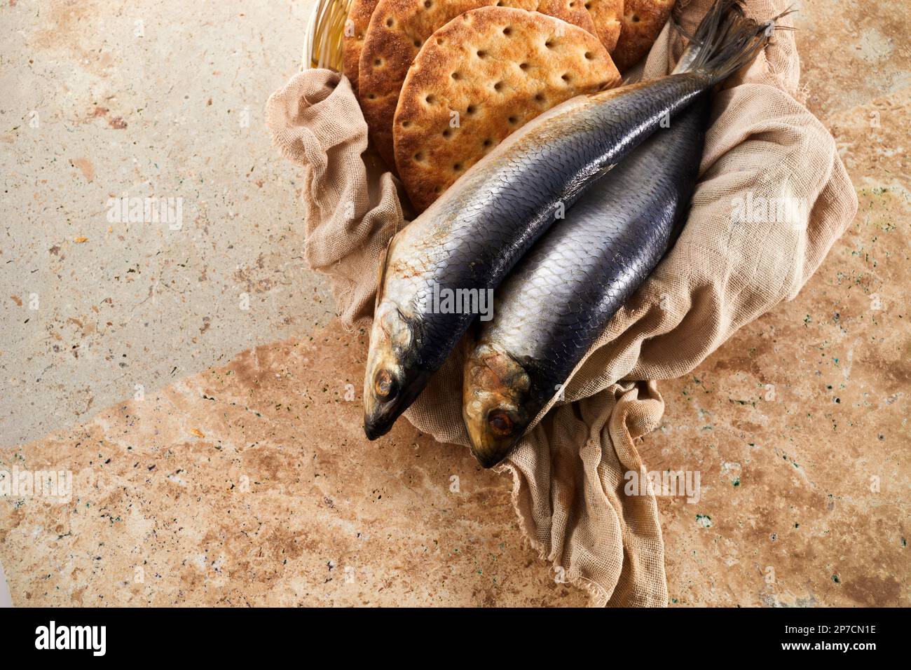 Vita ferma cattolica di cinque pani di pane e due pesci Foto Stock