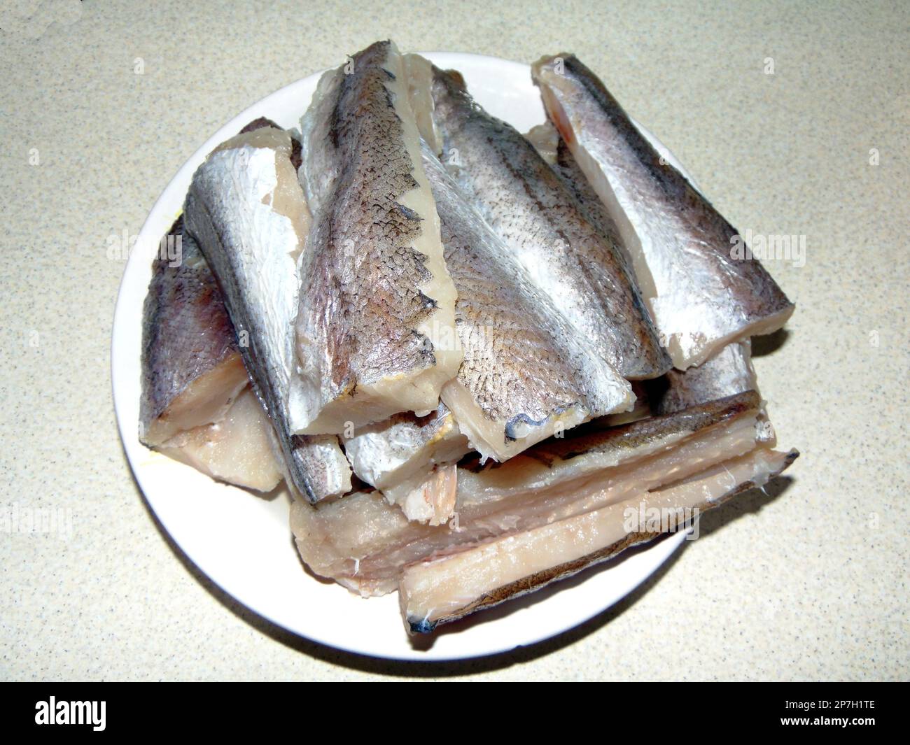 filetti di pesce su un piatto Foto Stock