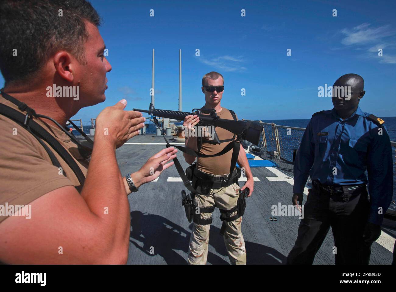 Gunners Mate First Class Benjamin O'Connor from Roanoke, Virginia, left