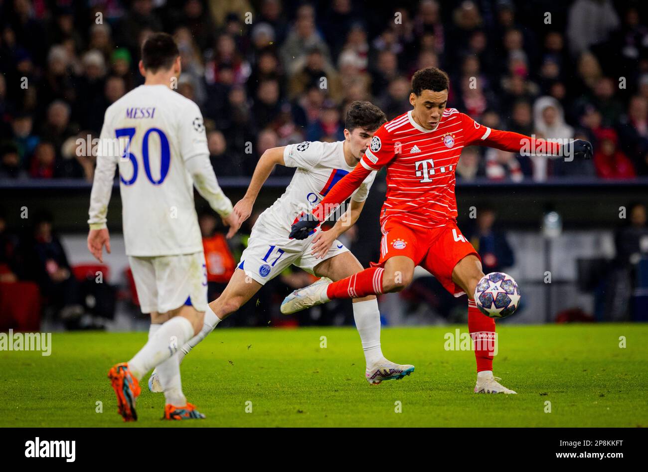 Munic, Germania. 8th Mar, 2023. Jamal Musiala (Muenchen), Vitinha (PSG) Bayern Munic - Parigi Saint Germain Bayern München - Parigi St Germain UEFA Cham Foto Stock