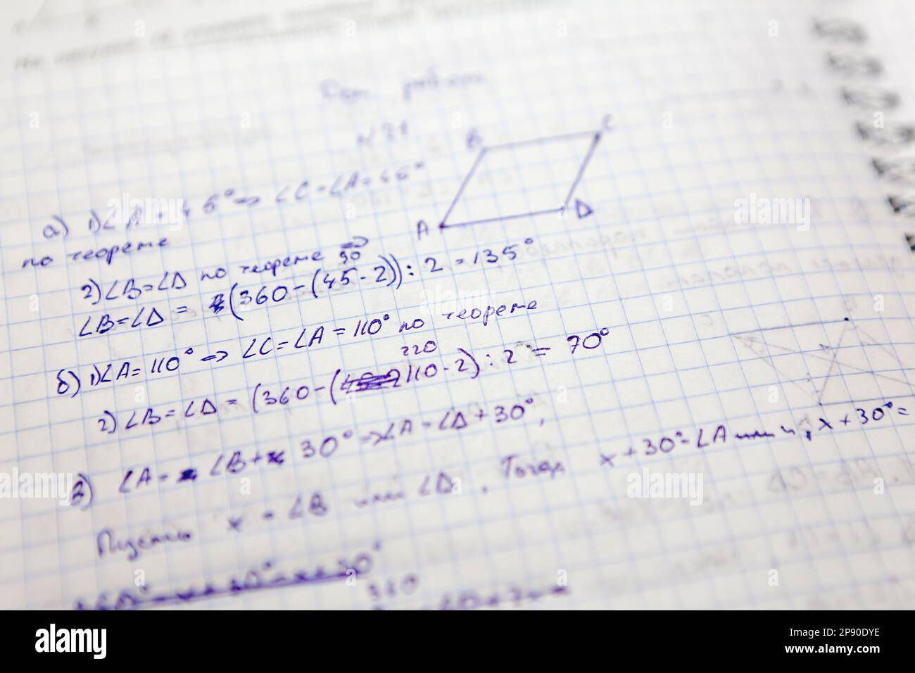 Appunti degli studenti con attività in geometria Foto Stock