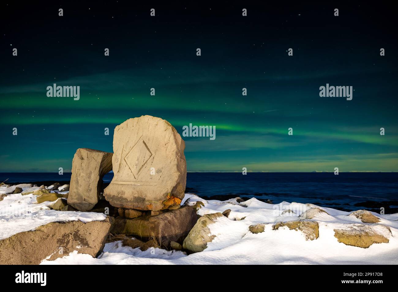 Aurora Boreale, display a Gardur faro, Reykanes Penisola, Islanda. Foto Stock