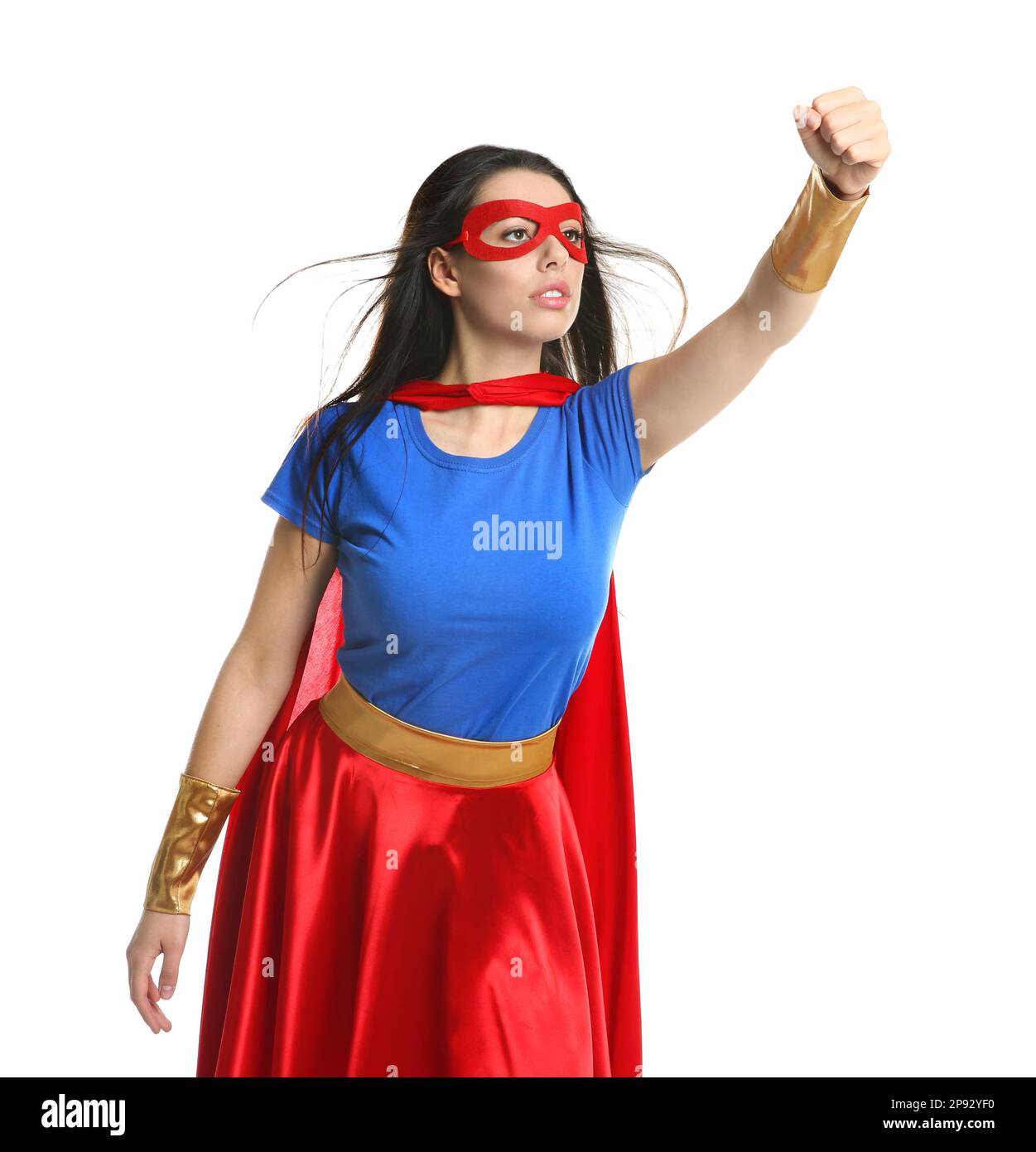 Donna sicura che indossa il costume di supereroe su sfondo giallo Foto  stock - Alamy