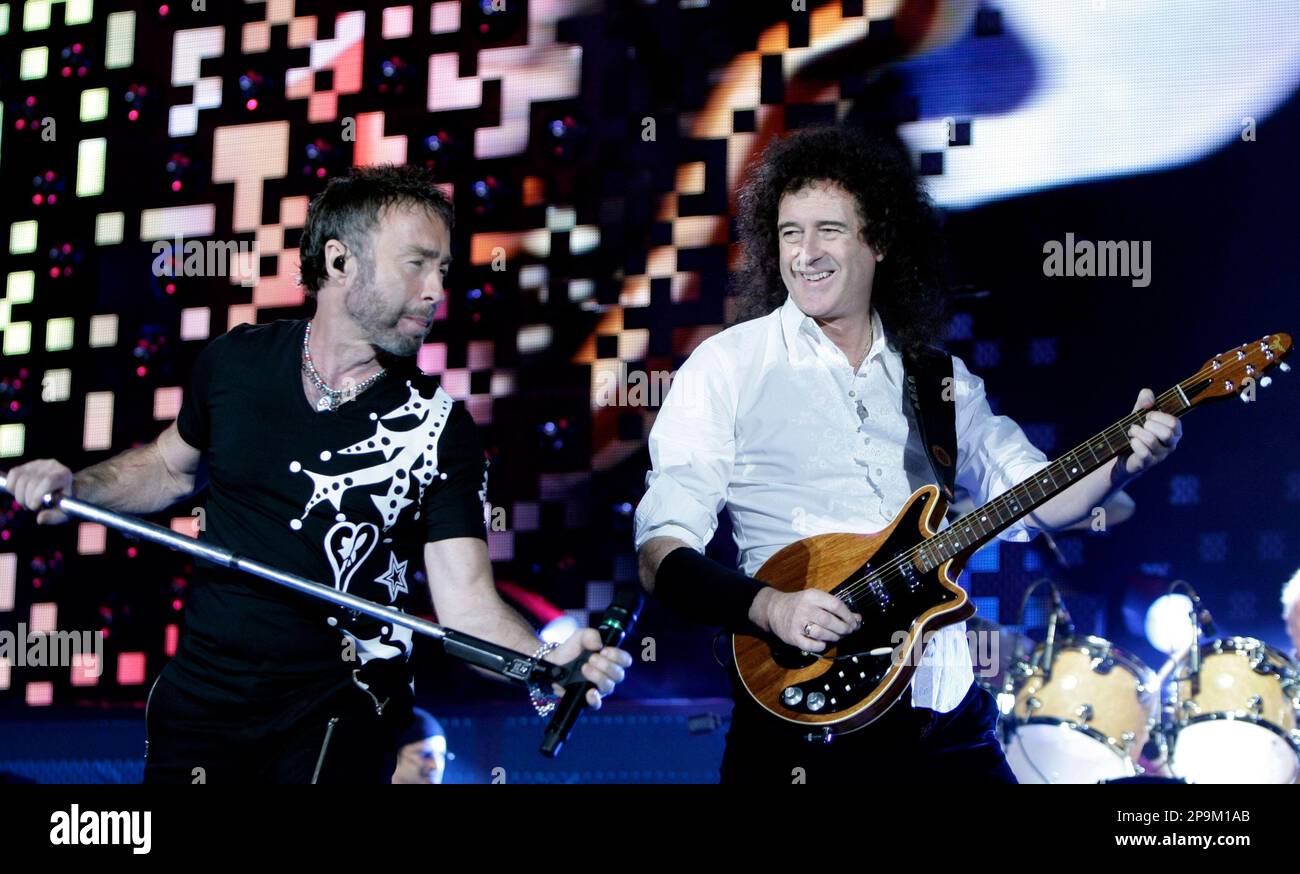 Singer Paul Rodgers and Brian May, from left, of British band Queen perform on stage during their "The cosmos rocks"- tour in Berlin, Germany, on Sunday, Sept. 21, 2008. (AP Photo/Miguel Villagran) Foto Stock