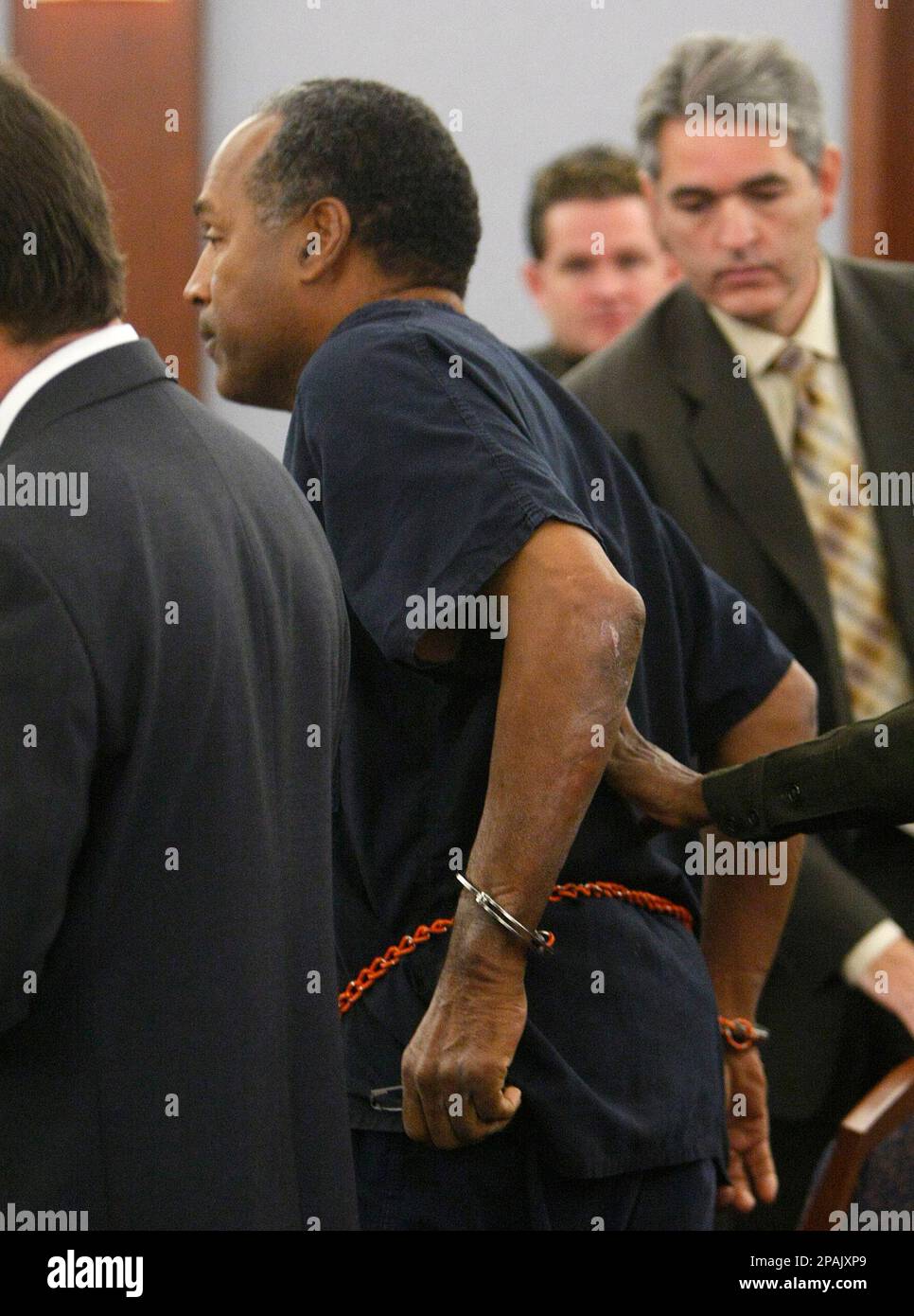 O.J. Simpson, center, appears in a courtroom for his bail revocation ...