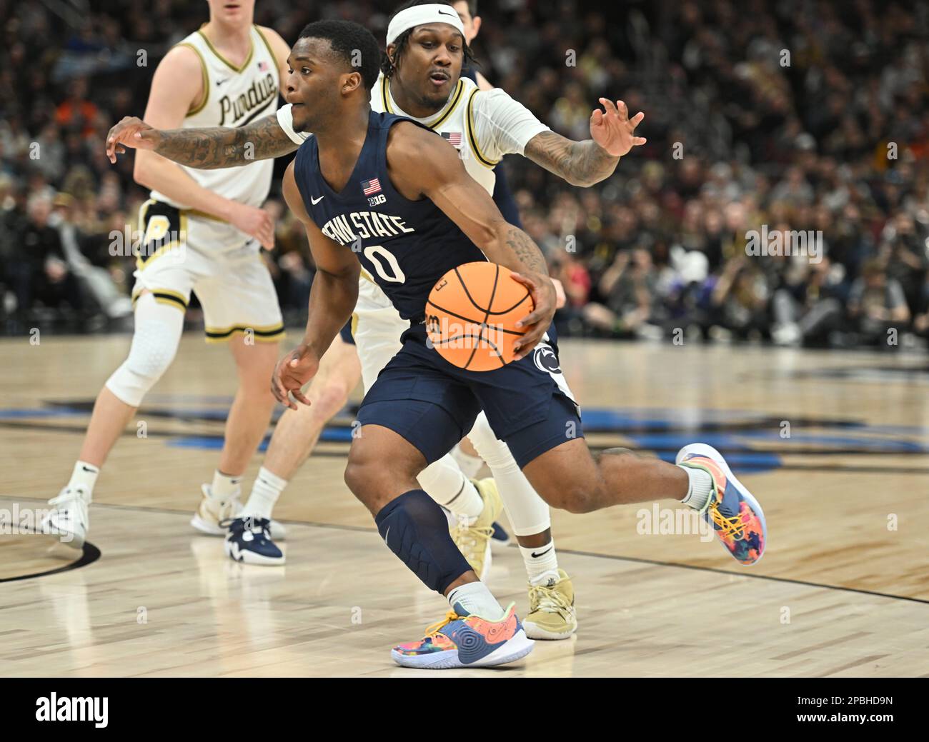 Chicago, Illinois, Stati Uniti. 12th Mar, 2023. La guardia Lions di Penn state Nittany Kanye Clary (0) si dirige verso il basket durante il campionato di pallacanestro maschile della NCAA Big Ten Conference presso lo United Center di Chicago, Illinois. Dean Reid/CSM/Alamy Live News Foto Stock