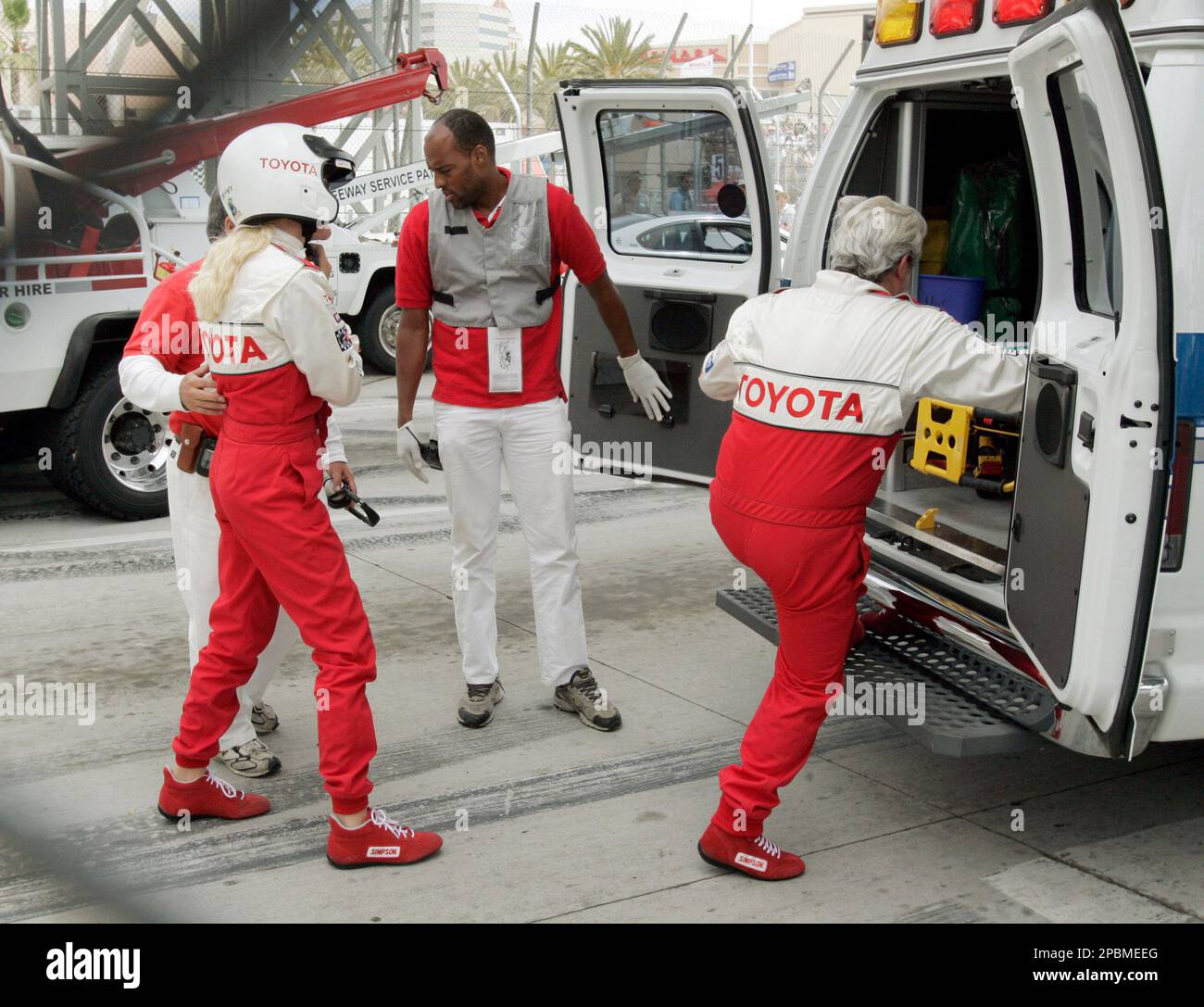 Movie magnate George Lucas gets into an ambulance after he and charity ...