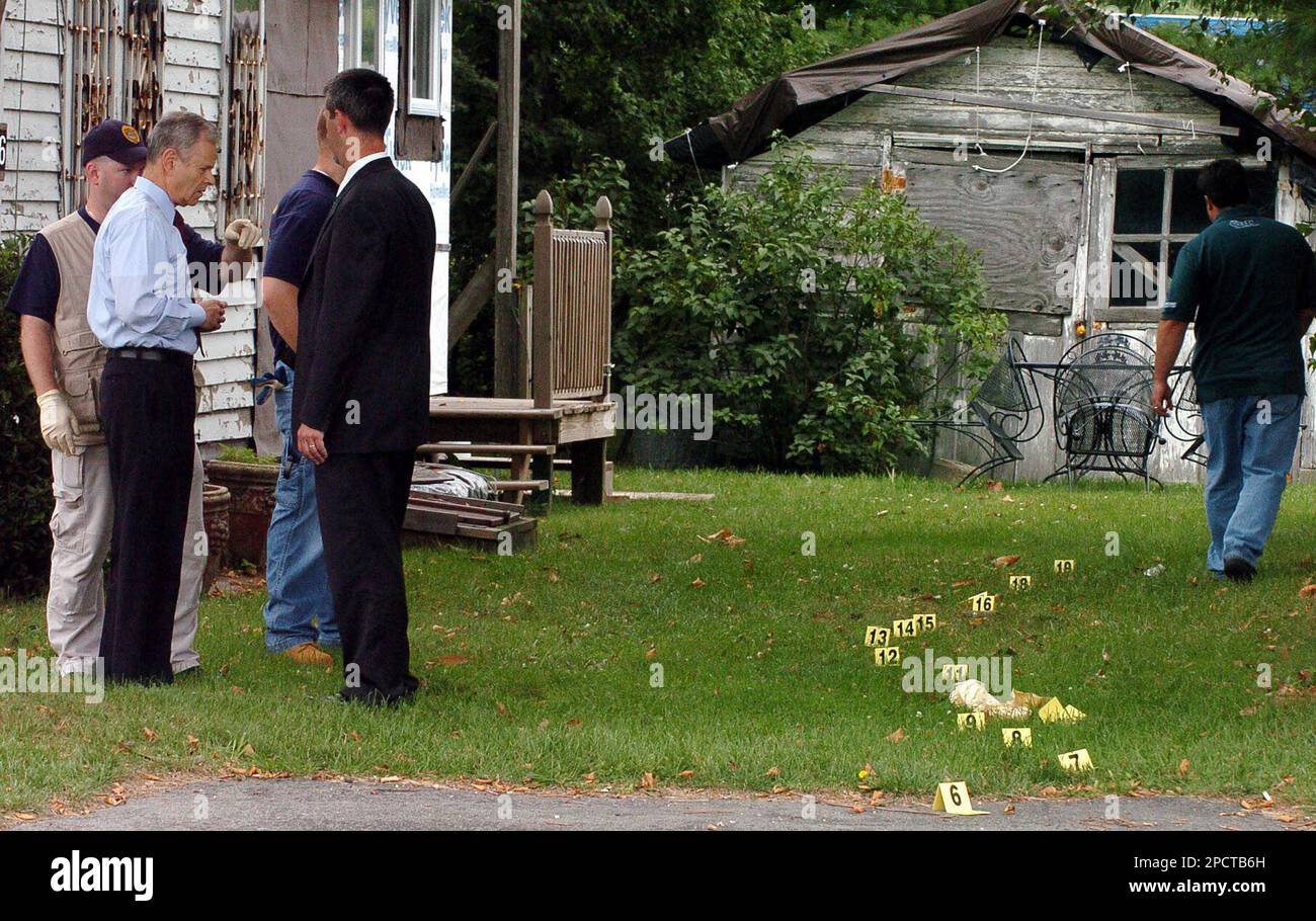 Atlantic County Prosecutor Jeffrey Blitz, second from left, talks with