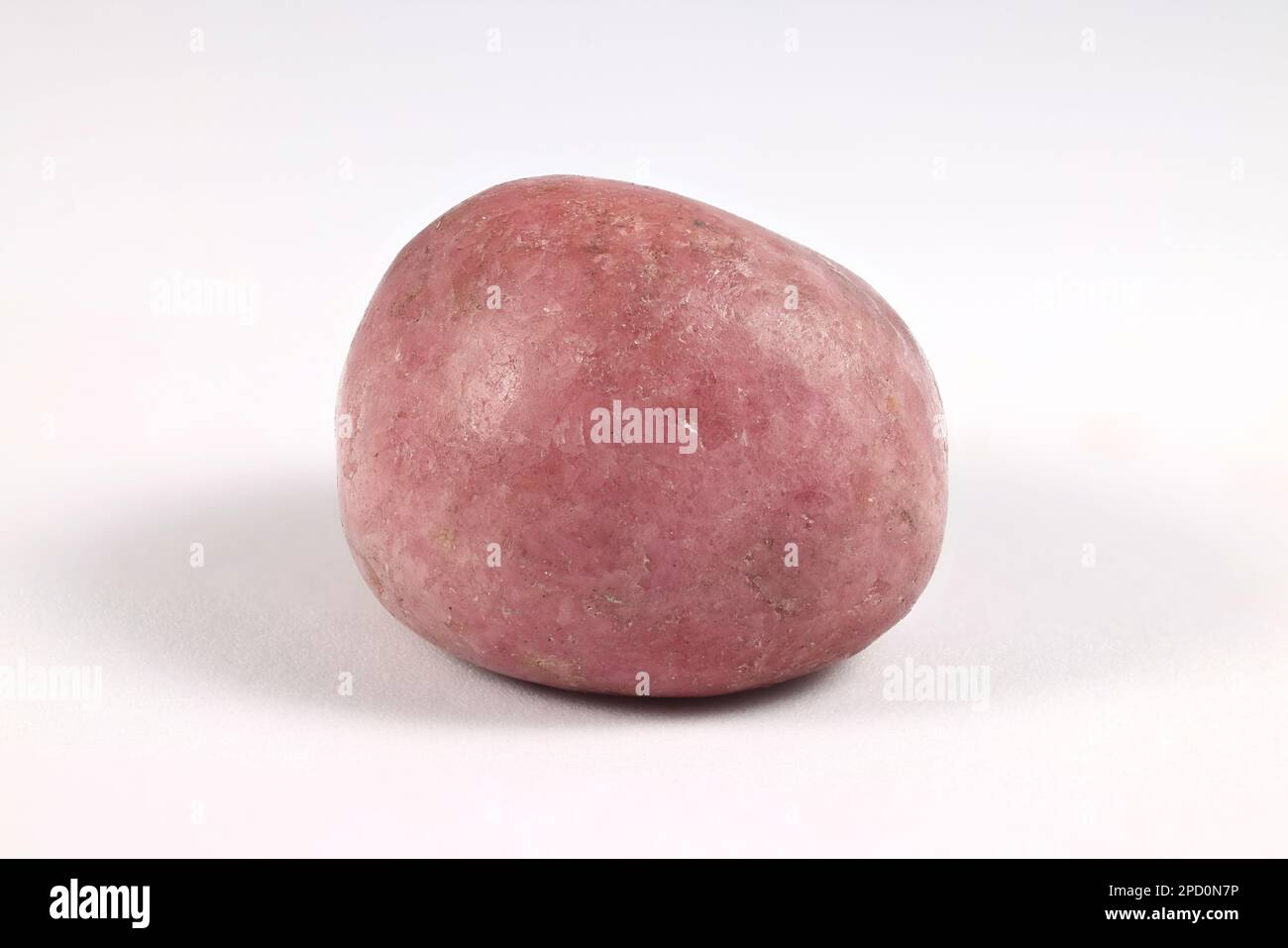 Rhodonite è un manganese, ferro, e silicato di calcio, e s gemma desiderabile e pietra ornamentale Foto Stock